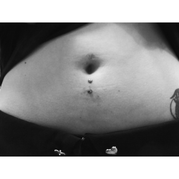 Double Dermal Anchors Navel Trail..
